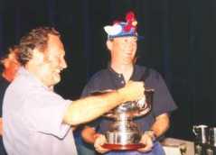 Martin Smith, commodore, presenting the Jim Wallin Memorial Bowl